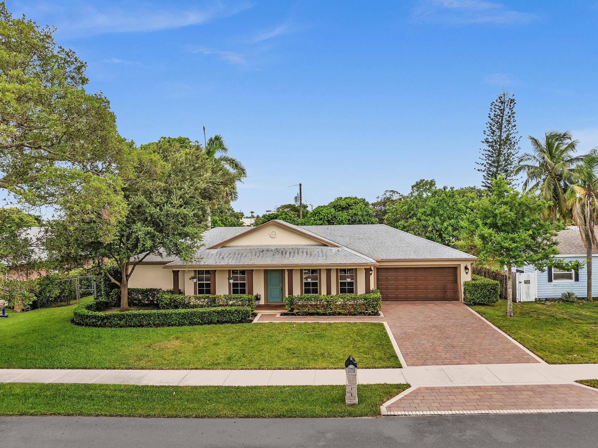 Newer East Delray Single Family 3 bedroom, 2 bath 2 Car Garage pool home on a huge double lot with no HOA.