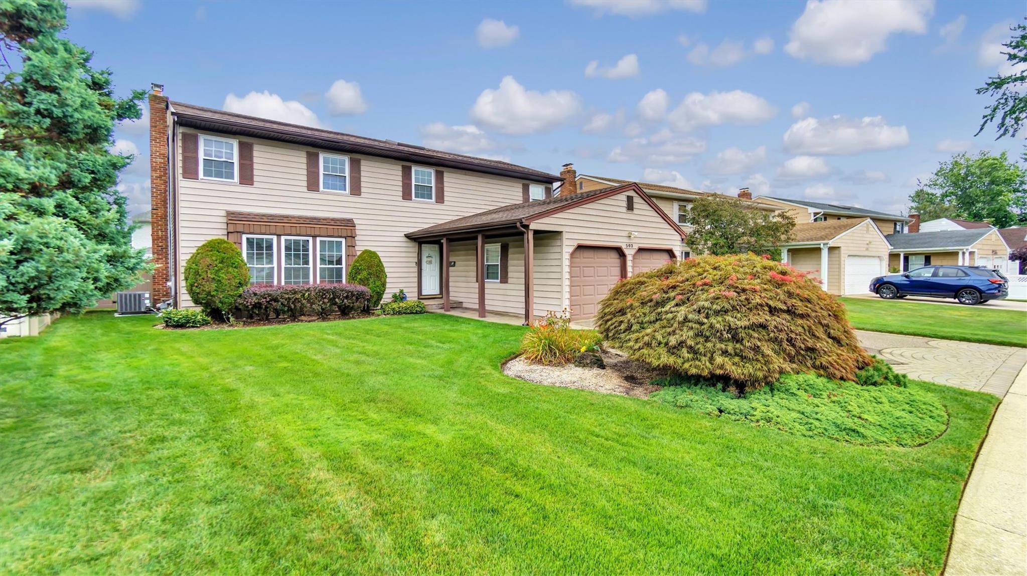 Located in the heart of East Meadow, this beautifully maintained 4 bedroom, 2.