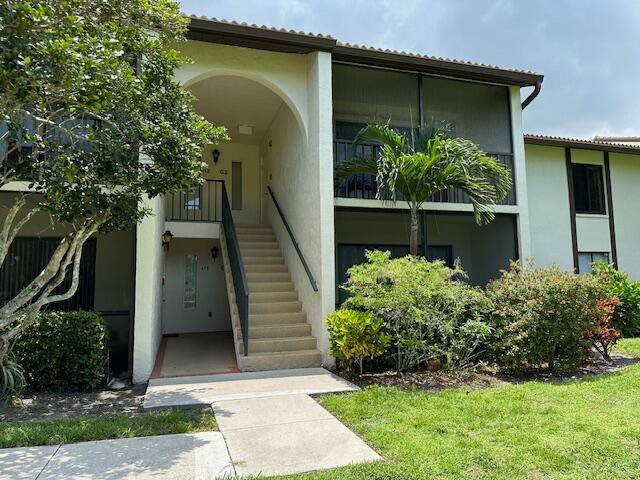 Lovey, move in ready 2 bedroom, 2 bathroom 2nd floor condo in highly sought after Palm City.