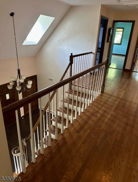 Welcome to this beautifully maintained Tudor style home that seamlessly blends timeless charm with thoughtful updates.
