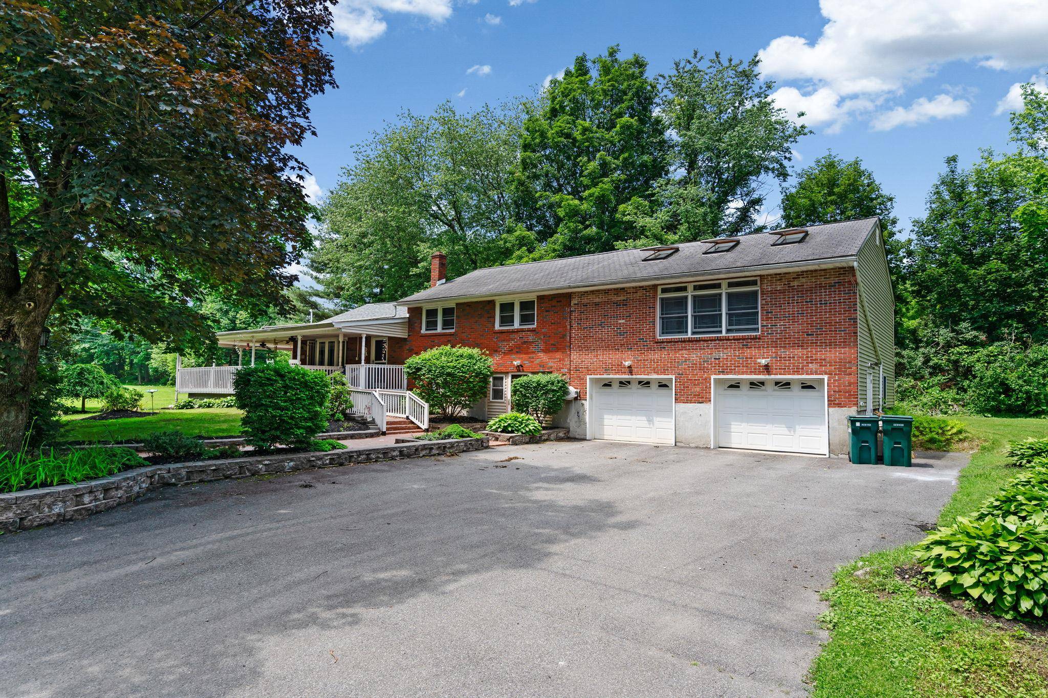 Step into a world of comfort and elegance with this remarkable five bedroom brick home, sprawled across 2, 800 square feet of stylish living space.