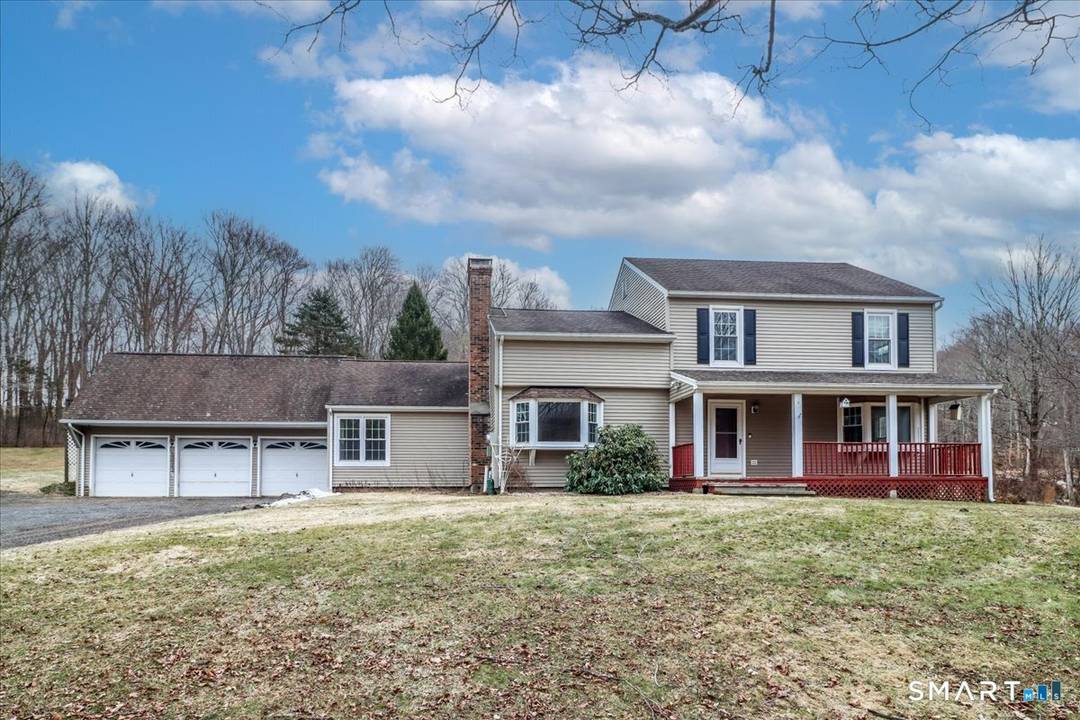 Welcome to 55 Litchfield Turnpike a charming farmhouse colonial set on 7.