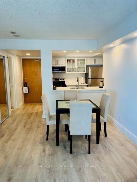Experience elevated urban living in this beautifully renovated one bedroom condo, perched on a high floor with stunning views of the lake.