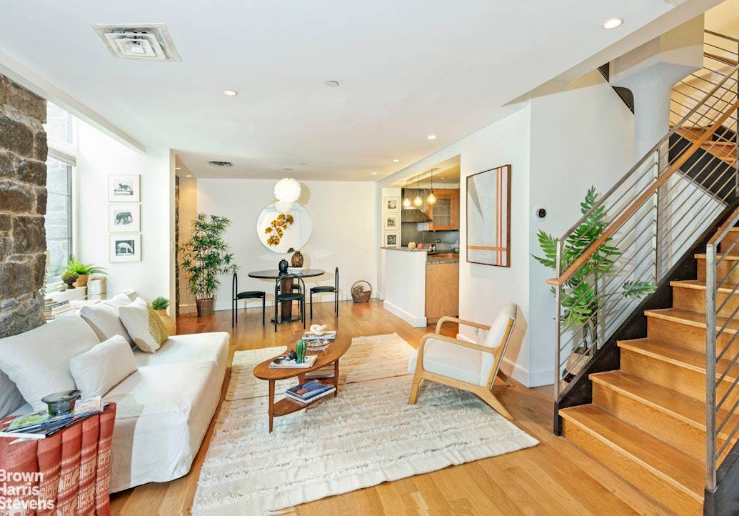 Welcome to this stunning condo duplex nestled in the heart of the historic and sought after neighborhood of Cobble Hill.
