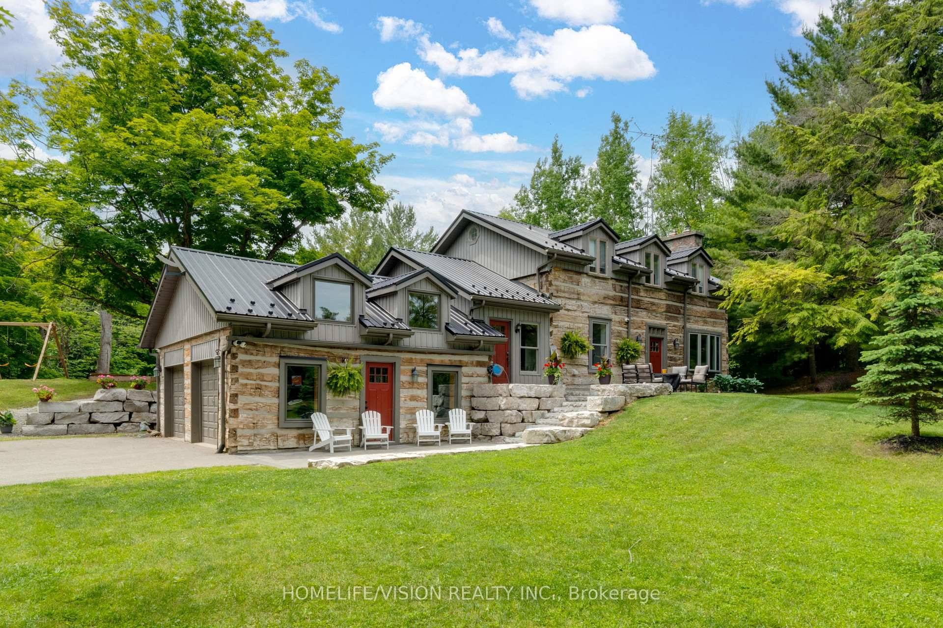 Spectacular Hewn Log Home with 3 1 bedrooms and 4 bathrooms on 2.