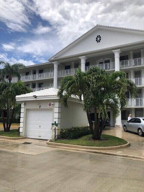 Beautiful view of golf and lake from balconies off living room and master bedroom.