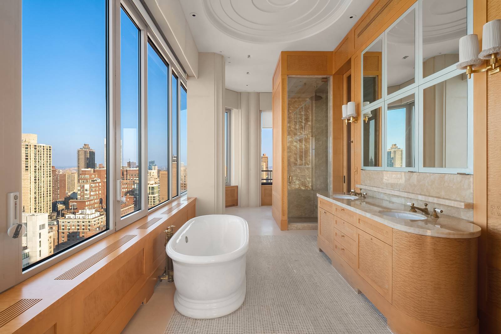 Full floor Trophy Triplex Penthouse atop 30 East 85th Street.