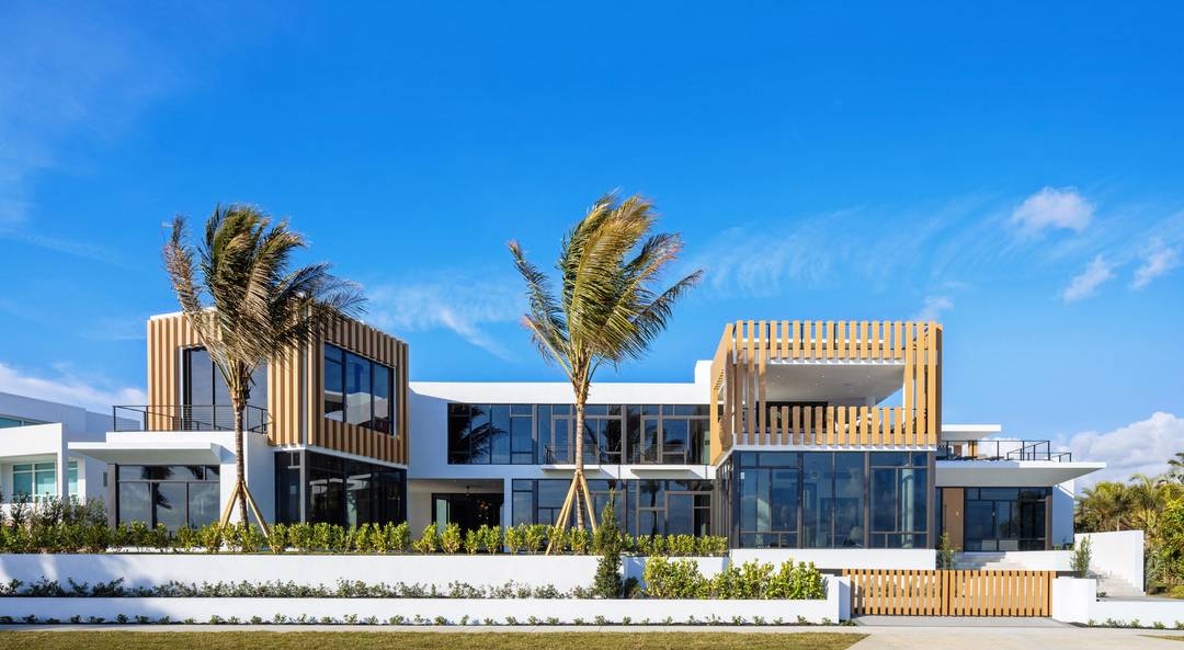 HOUSE IS FURNISHED ! Perched on the Intracoastal Waterway overlooking Palm Beach Island's mega mansions, this BESPOKE waterfront new construction is one of the most exceptional homes ever brought to ...