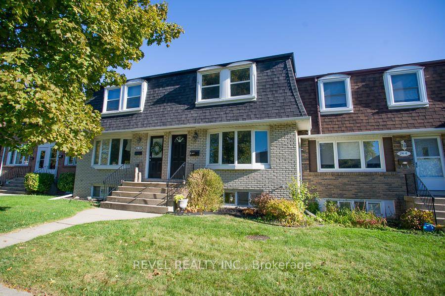 Welcome to 24 Coachwood Drive 5, where timeless Tudor character meets modern comfort in over 1, 357 sq.