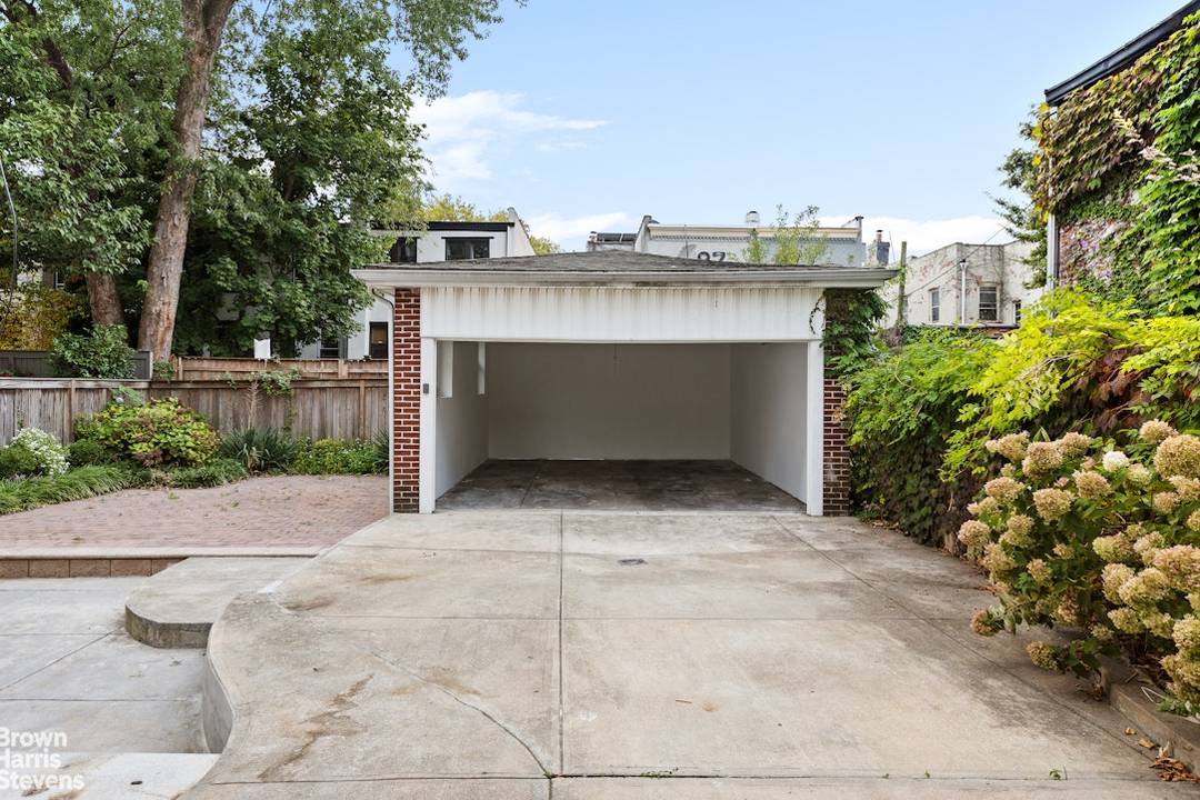 With a two car garage and long driveway with space for four additional parking spots, an expansive backyard patio, and a full lounge level with a wet bar, 36 Rutland ...