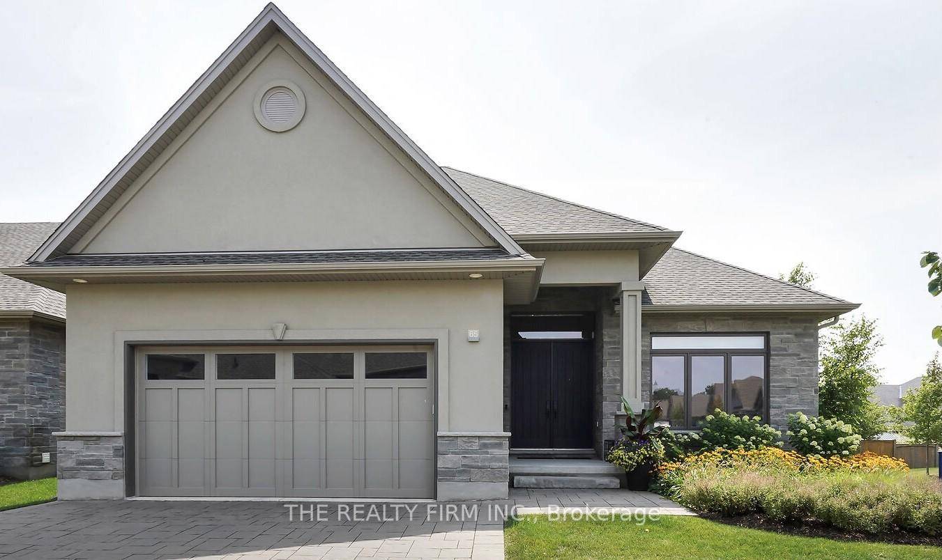 Welcome to this stunning premium end unit bungalow in the exclusive Ridge at Byron offering unmatched privacy, security, and meticulous care in a highly sought after enclave.