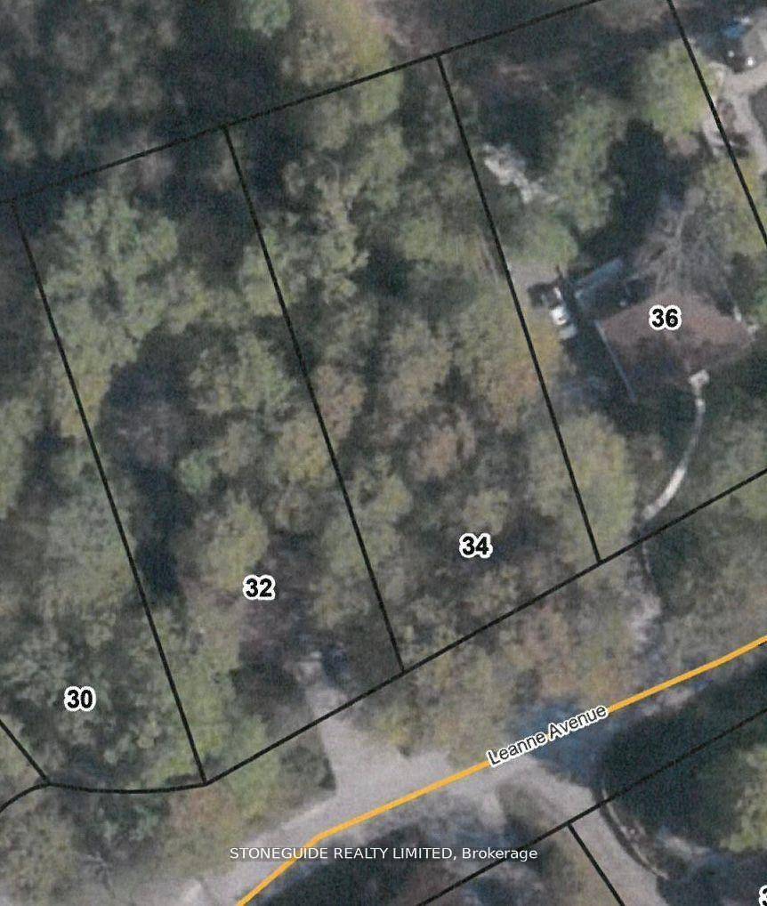 Wooded residential building lot in an area of fine homes located on the outskirts of the city of Peterborough.