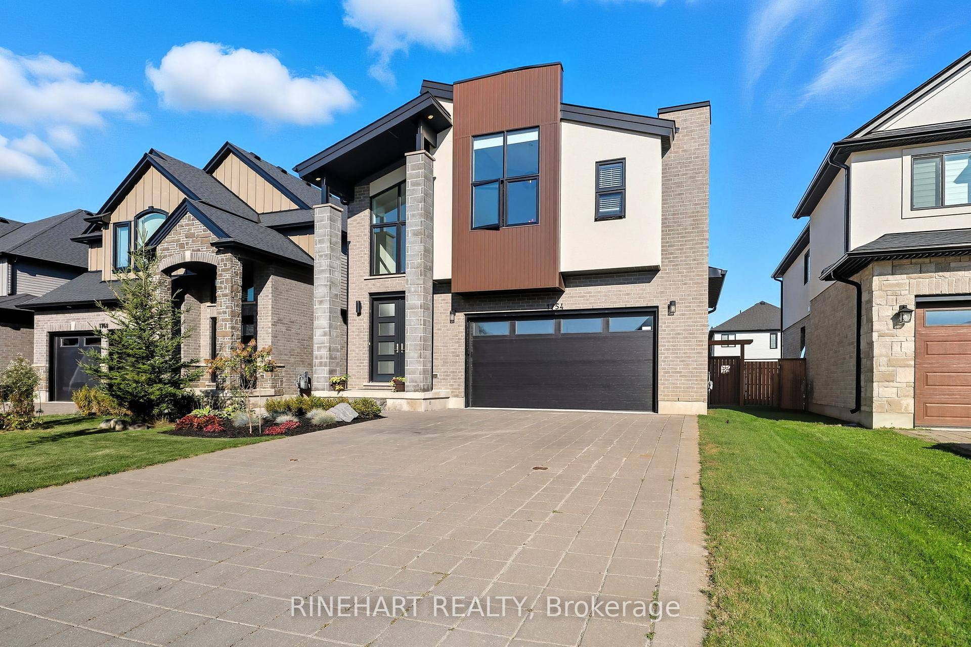 Welcome to 1754 Brayford Avenue, a stunning contemporary home in the sought after Wickerson community, just steps from the ski hills and year round activities at Boler Mountain.