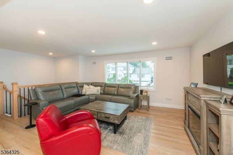 Prepare to be wowed ! A truly unique and beautifully expanded custom home !