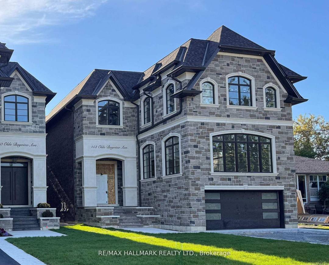 BRAND NEW CUSTOM EXECUTIVE HOME, PROUDLY SET ON A 150' LOT IN THE HIGHLY DESIRED LAKE WILCOX COMMUNITY.