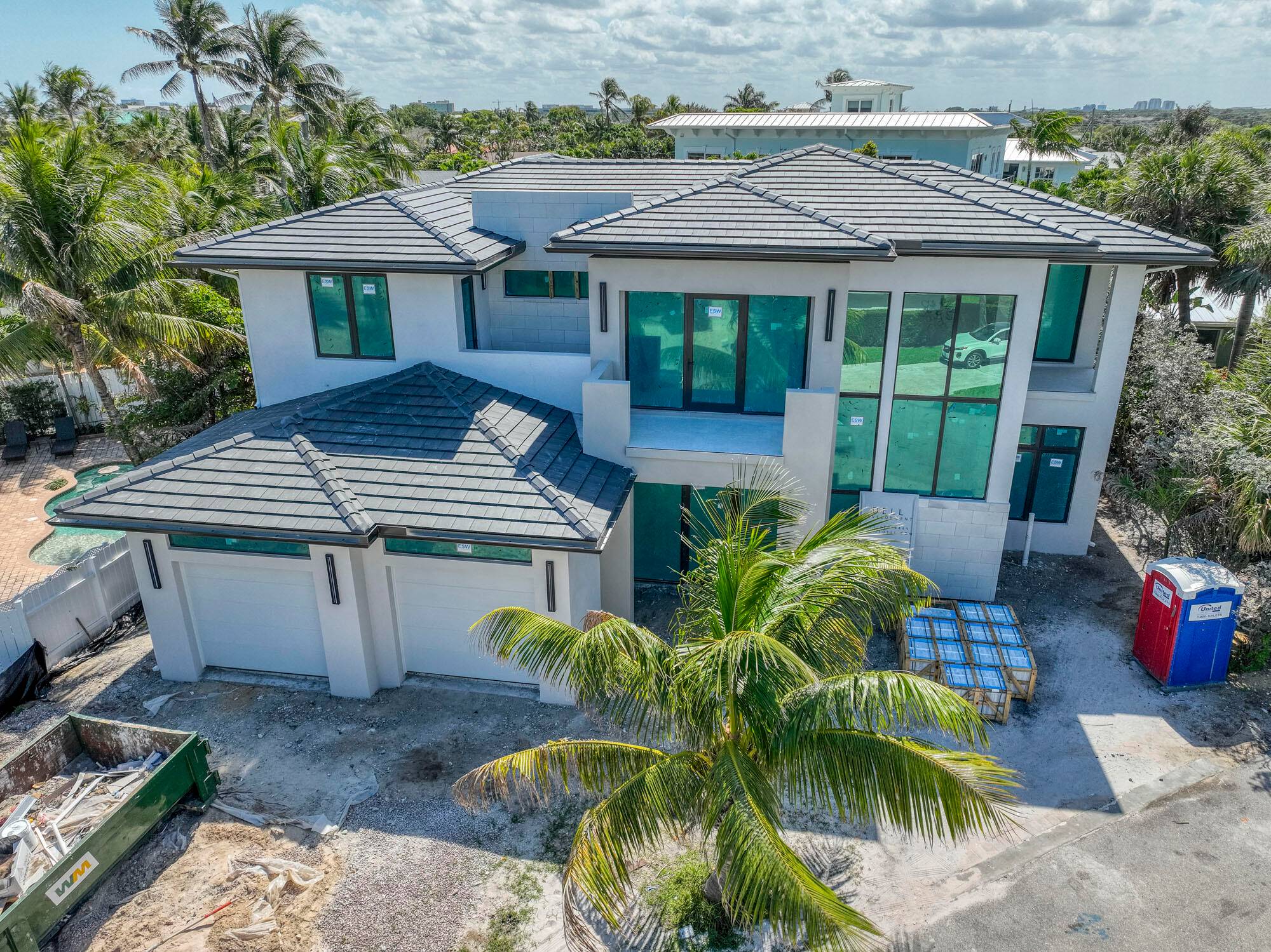 Steps to the beach. Nestled within the highly sought after enclave of Juno Beach lies this exquisite example of modern new construction.
