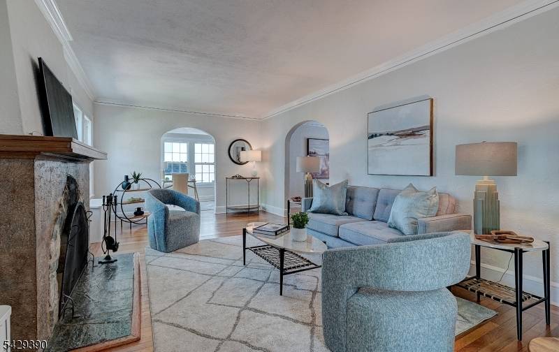 Welcome to this classic Colonial, ideally situated on a picturesque tree lined street in Maplewood.