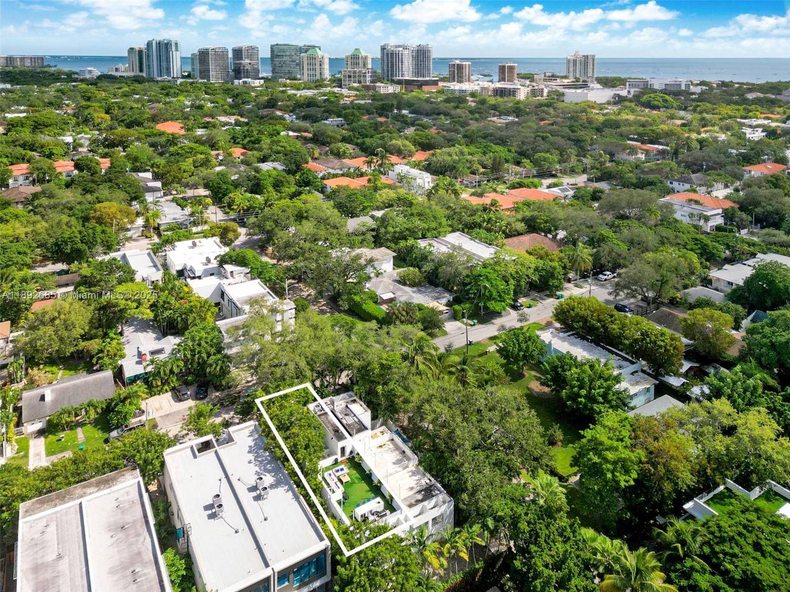 The Glasshouse is a modern architectural gem in the heart of Coconut Grove !
