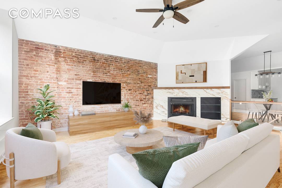 SUN SPLASHED amp ; RENOVATED, DREAMY DUPLEX w WORKING FIREPLACE amp ; CENTRAL AC Supremely located and superbly unique, this renovated home is immensely livable and lovable.