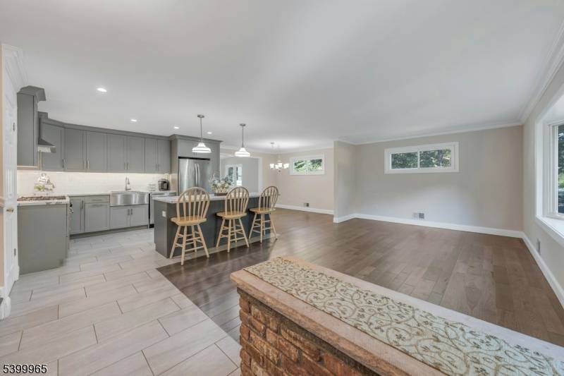 This beautifully expanded and renovated home showcases 5 spacious bedrooms and 3 full bathrooms, designed with style and comfort in mind.