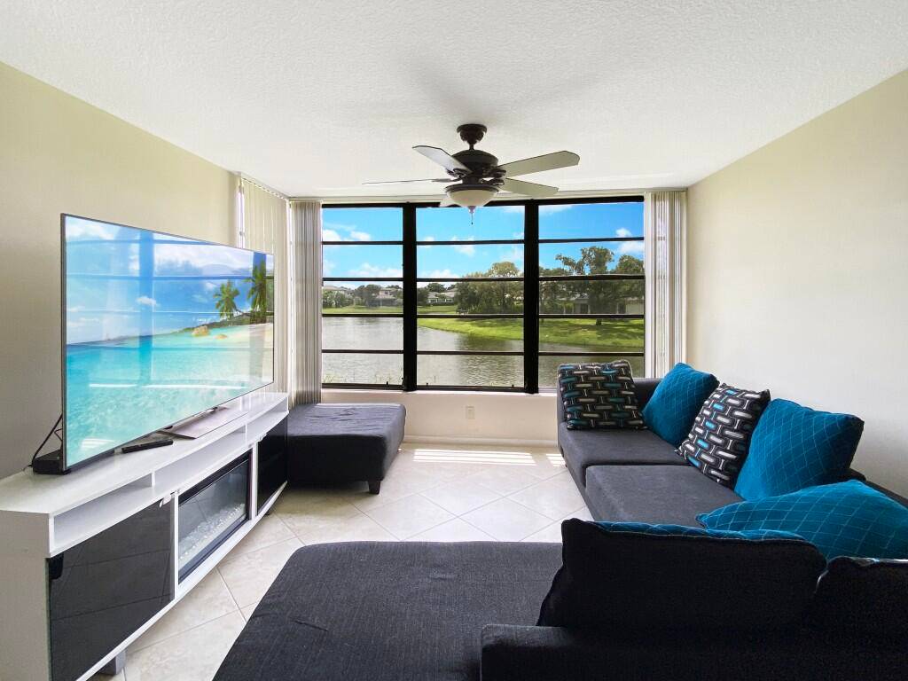 Light and Bright with an Open Floor Plan this beautifully updated condo with Million Dollar Water Views in a Gated Community featuring 24 hour manned security.