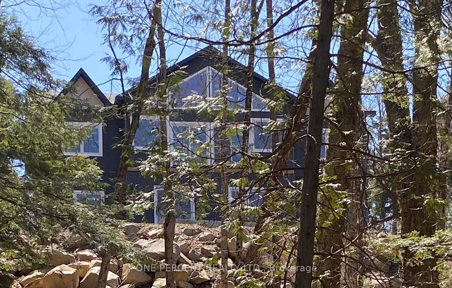 Newly built almost 2000 sq ft home built with a large foyer and cathedral ceiling living room with pine and large patio doors to build your own deck.