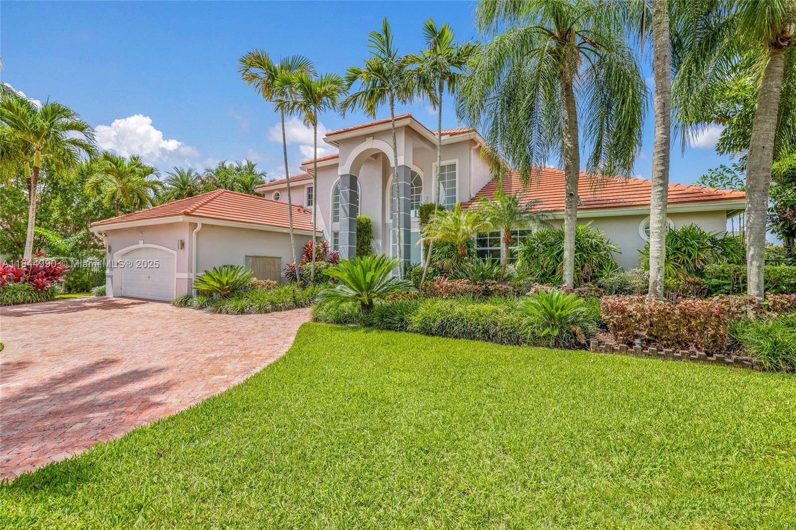 Experience luxury living at its finest in this exceptional Weston Hills residence.