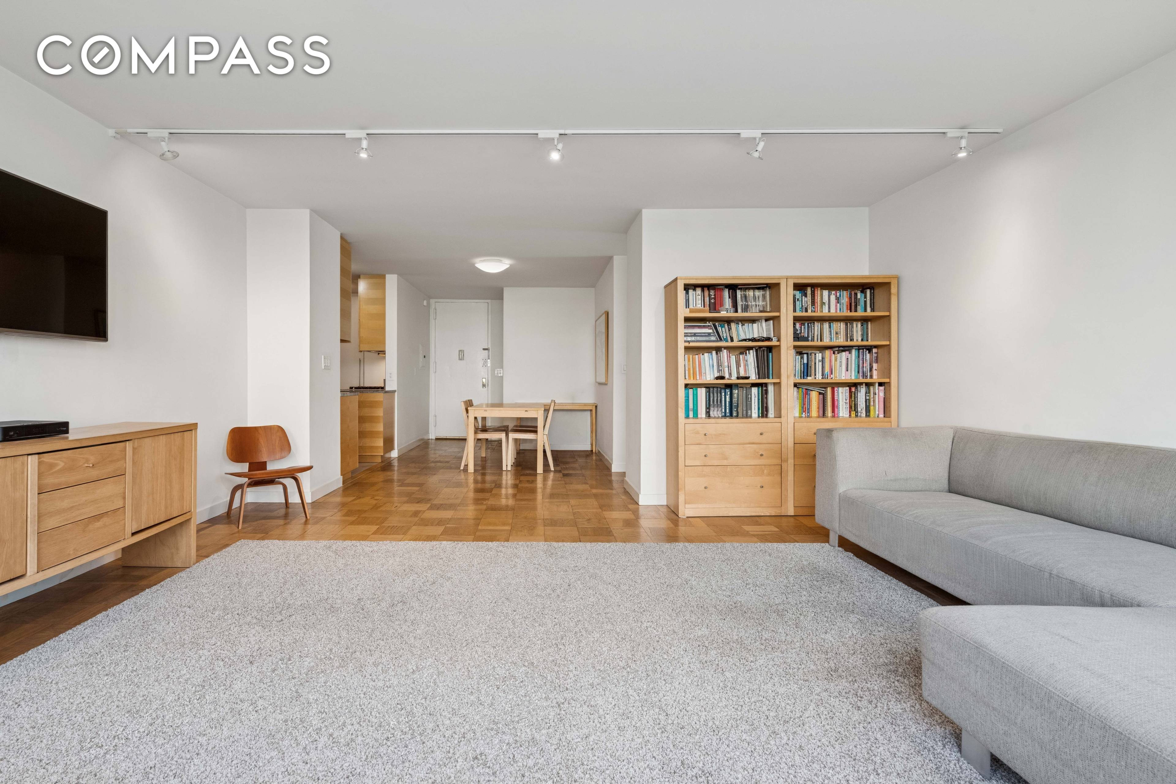 Rarely available garden facing corner three bedroom, two bath residence at I.