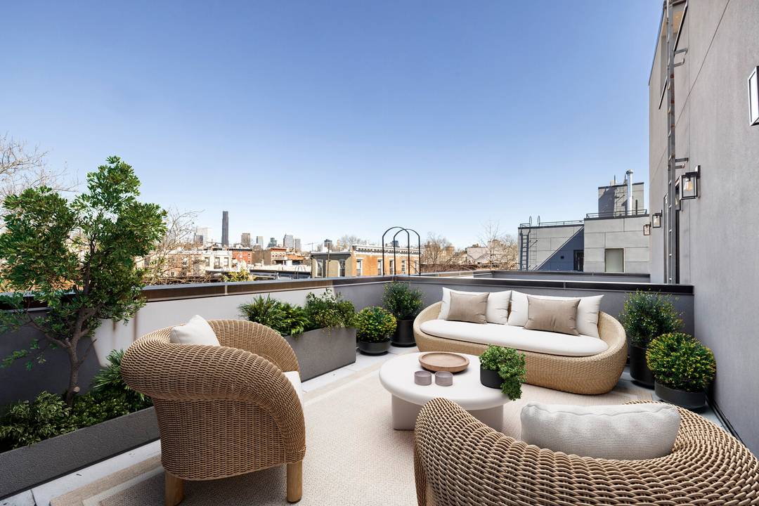 Introducing 110 Luquer Street, nestled in the vibrant heart of Carroll Gardens !