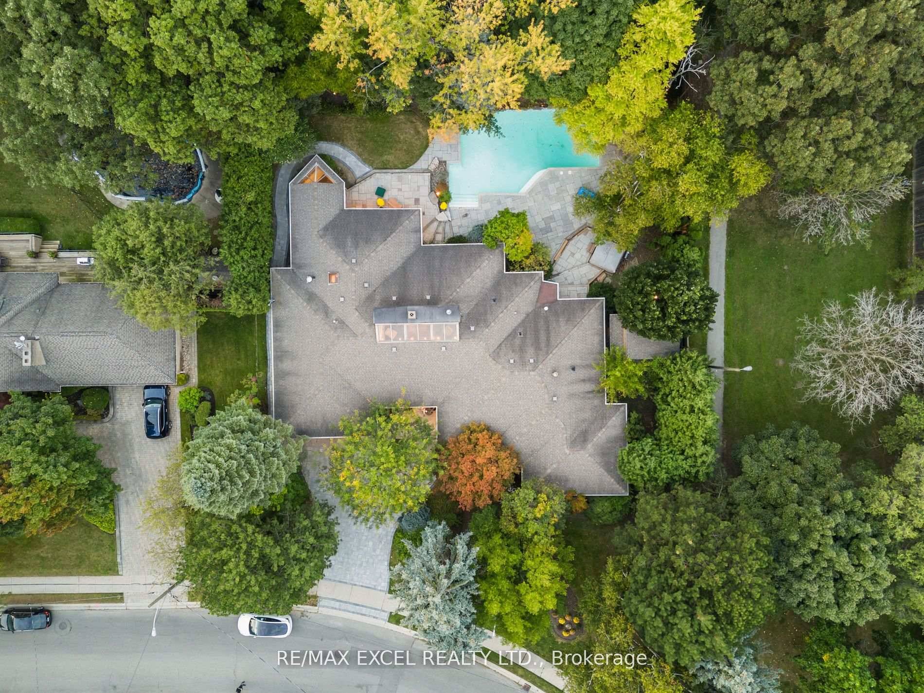 This stunning custom built residence, designed by renowned designer, boasts a premium lot measuring 128 by 159 feet.