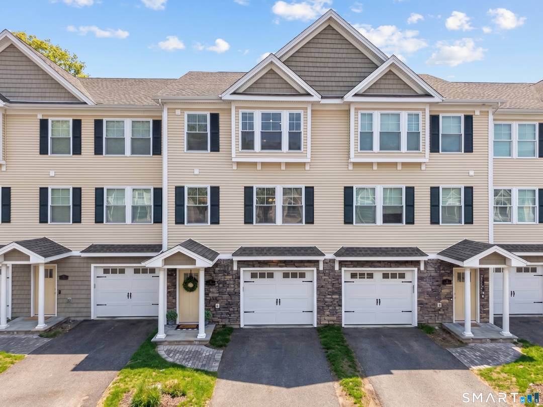 11 Village Crossing offers a spacious and thoughtfully designed layout featuring two full bathrooms, one half bath, and a two car under house garage.