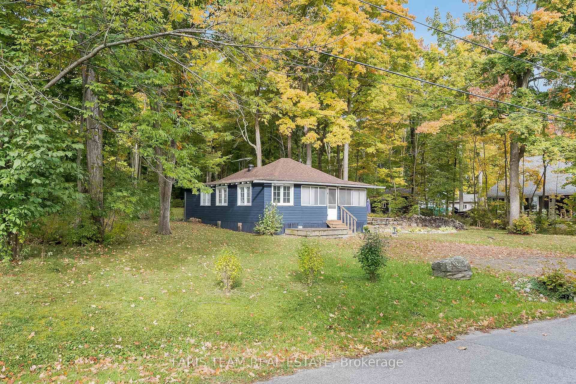Top 5 Reasons You'll Love This Home 1 Incredible location with unobstructed water views and direct access just steps away, perfectly positioned for your future dream build in a peaceful, ...