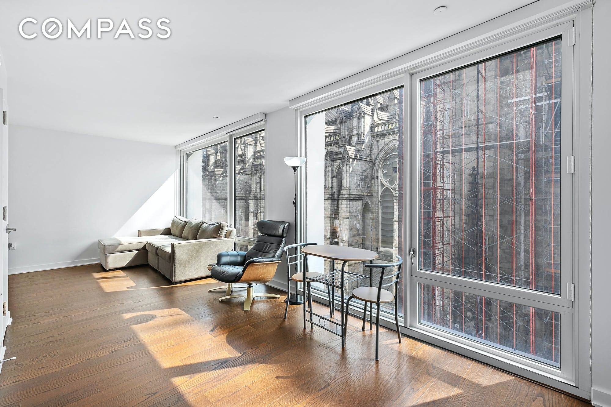 Spacious and sunny 1 bedroom has floor to ceiling windows with amazing views of the Cathedral.
