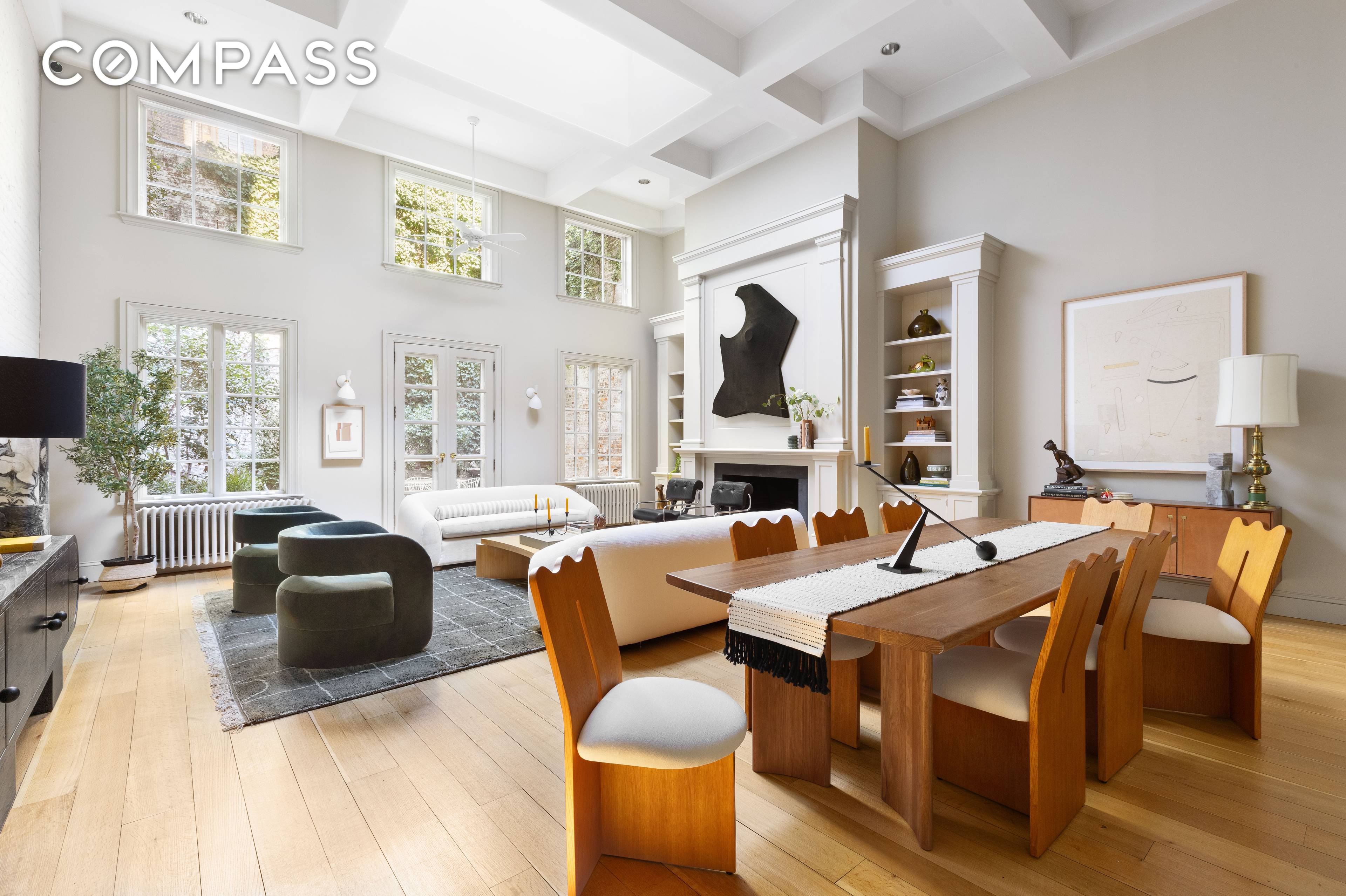 Situated in one of Chelsea's most prestigious residential blocks, this captivating carriage house is a rare gem.