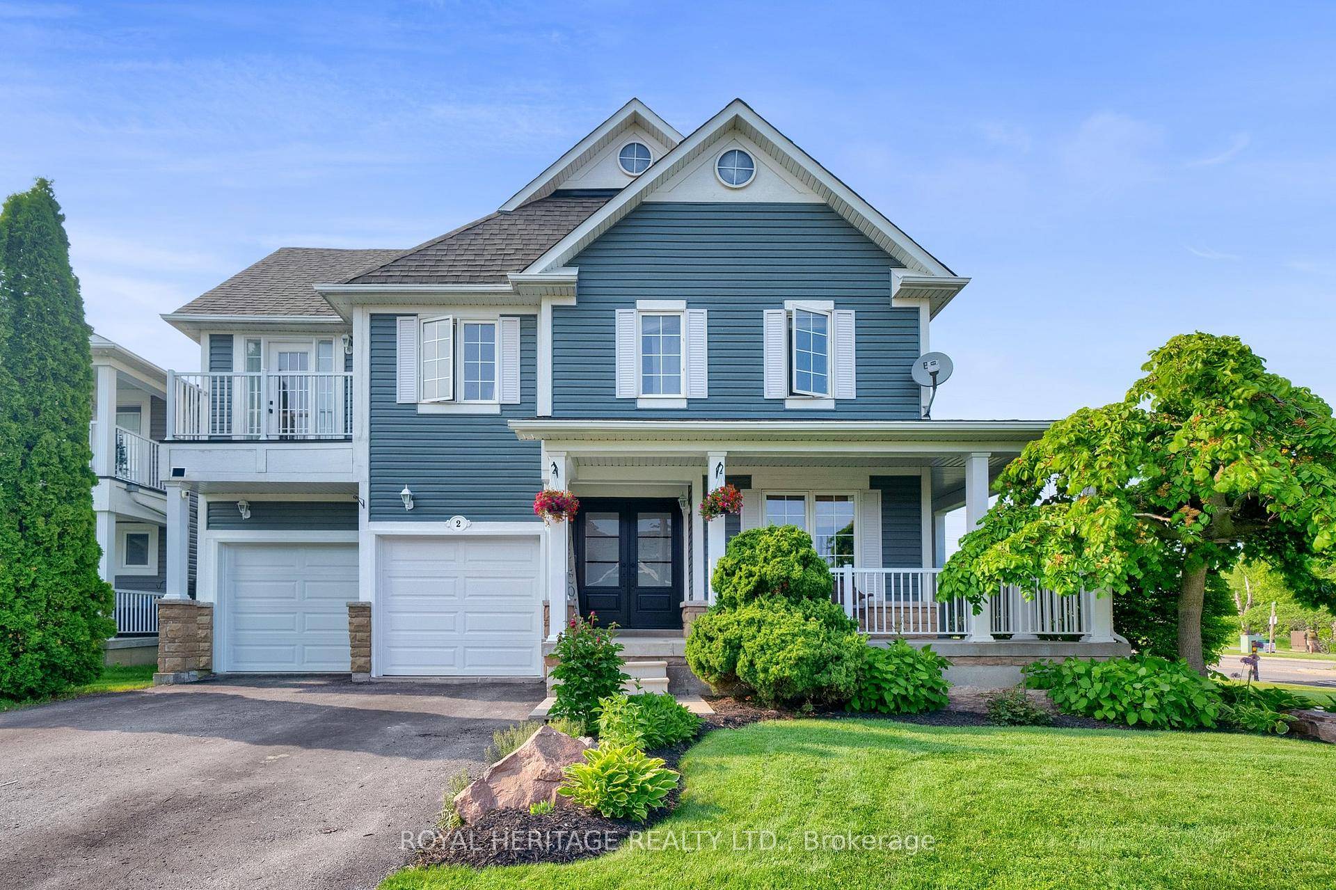 Nestled between serene waterfront trails and lush greenspace on an impressive 50' corner lot with no neighbours behind in the popular Port of Newcastle Lakeside Community.
