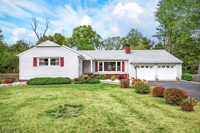 Ultra clean ranch with 2 car garage, sunroom, wood burning fireplace, rear patio, whole house generator, full basement with professional waterproofing and Bilco door, formal dining room.