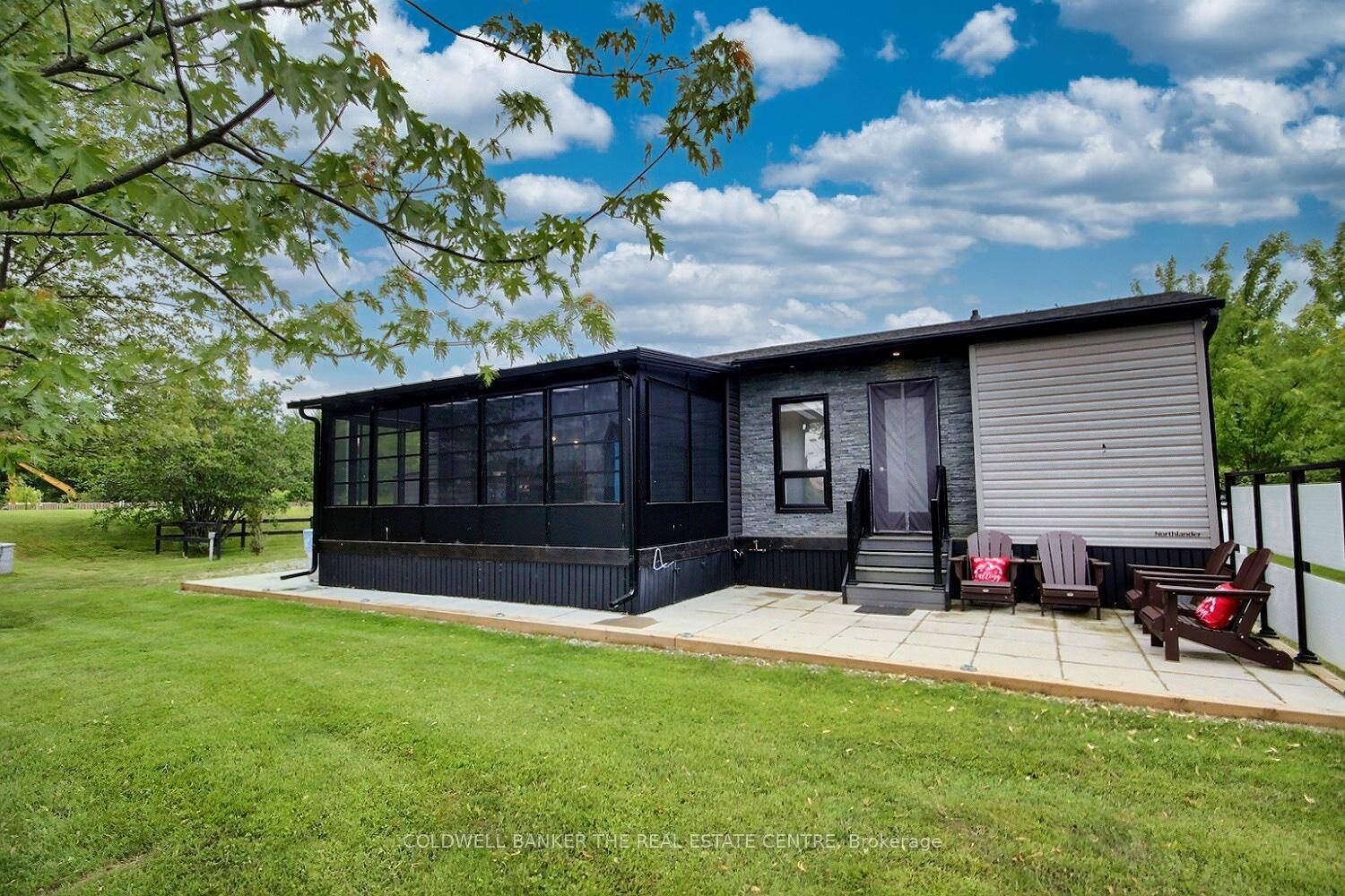 Welcome to Unit 31 at Lauderdale Point Marina Resort, a beautifully upgraded 2021 Northlander modular home in a quiet, private spot backing onto peaceful ponds and landscaped gardens.