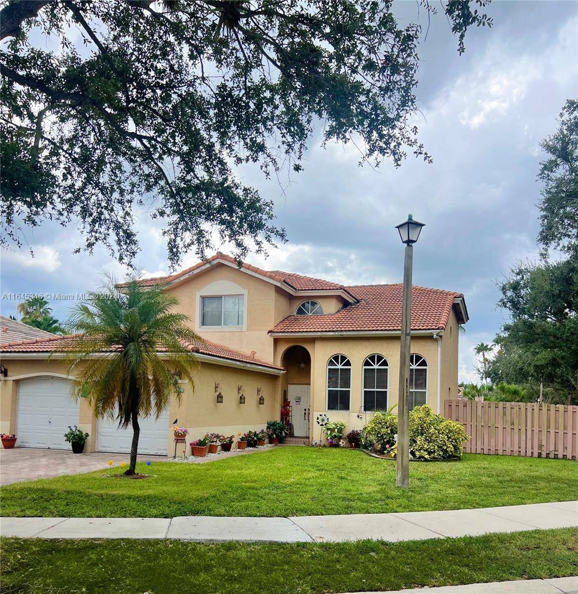 MOTIVATED SELLERS ! ! ! Reduced to 685K Appraised Value Lovely, spacious, 2 story corner property with 4 bedrooms, 3 bathrooms in a semi secluded gated community in Davie, FL.