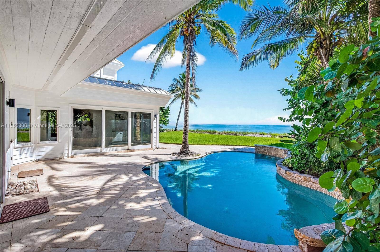 Direct oceanfront estate set on over an acre in a gated cul de sac enclave of only 20 homes, located south of John s Island and minutes from Vero s ...