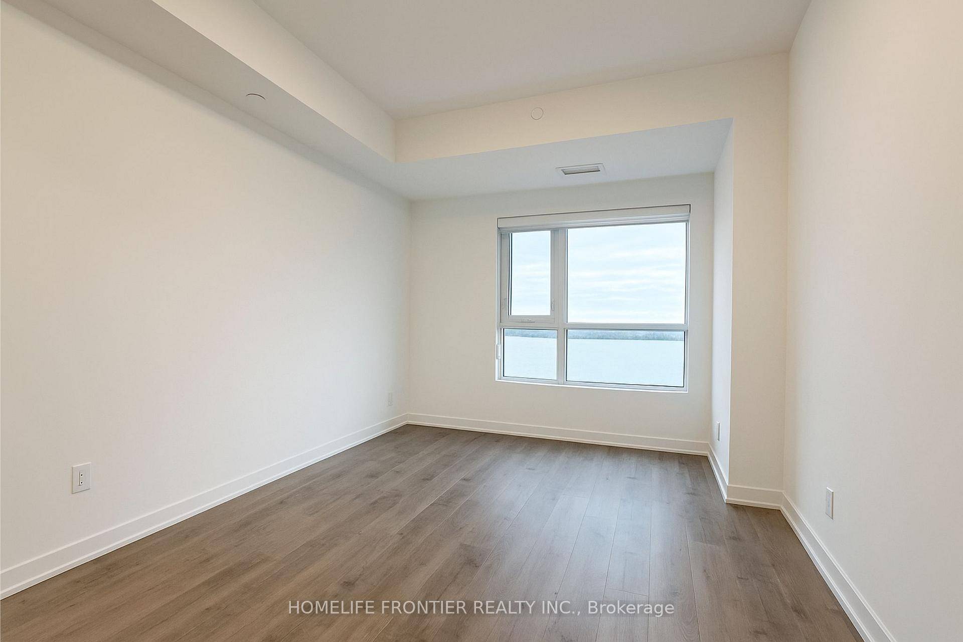 Welcome to a Luxury Corner Unit with Lake View.