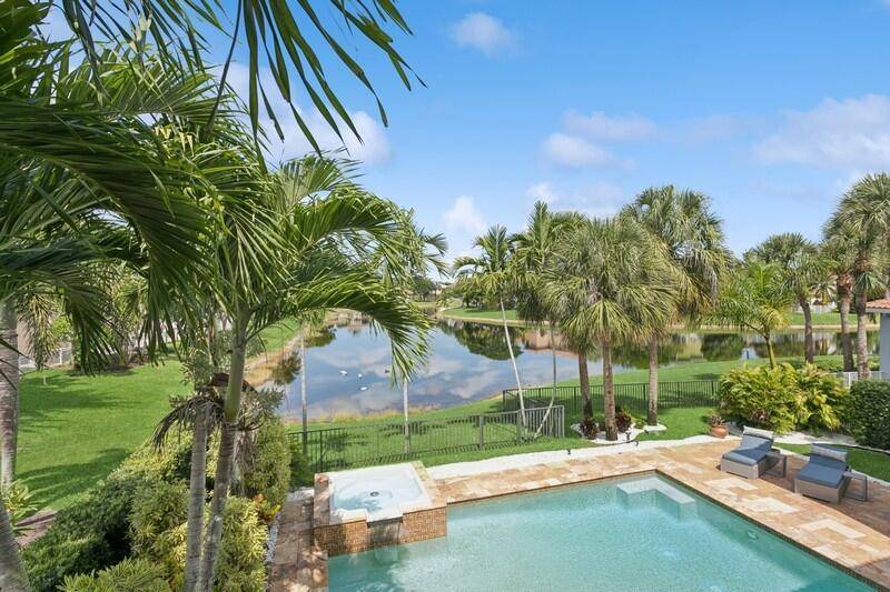 Tucked away on a quiet cul de sac within the coveted Grand Estates section of Journey's End, this stunning residence sits on one of the most desirable lakefront lots in ...