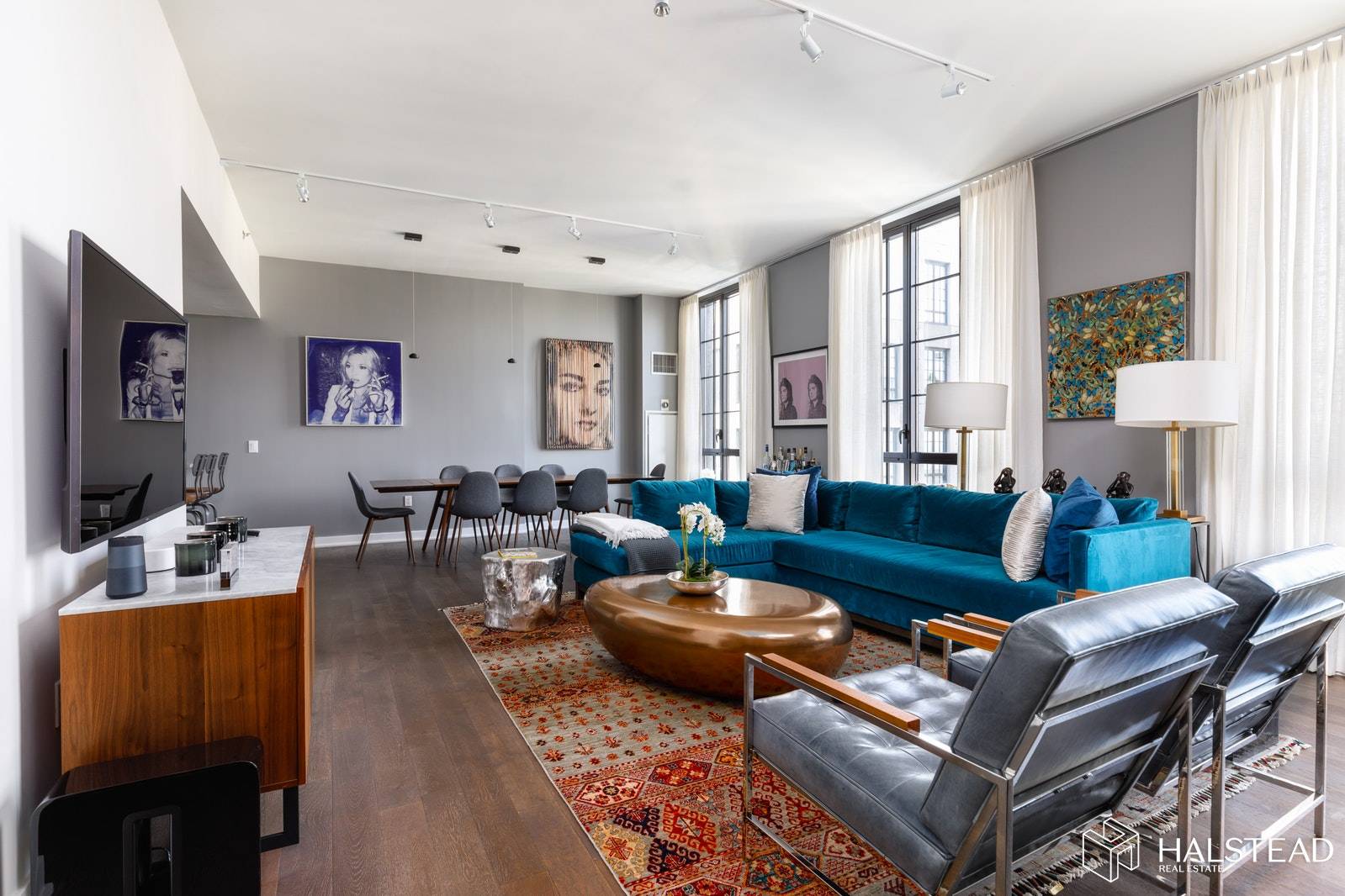 Amazement will be your reaction when you enter this stunning penthouse duplex with an almost 30' wide loft like living space.