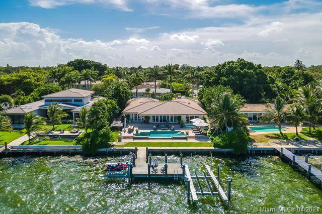 STUNNING WATER FRONT PROPERTY IN PRESTIGIOUS NEIGHBORHOOD OF MIAMI SHORES, SEATING RIGHT ON THE BAY FACING EAST OF MIAMI BEACH.