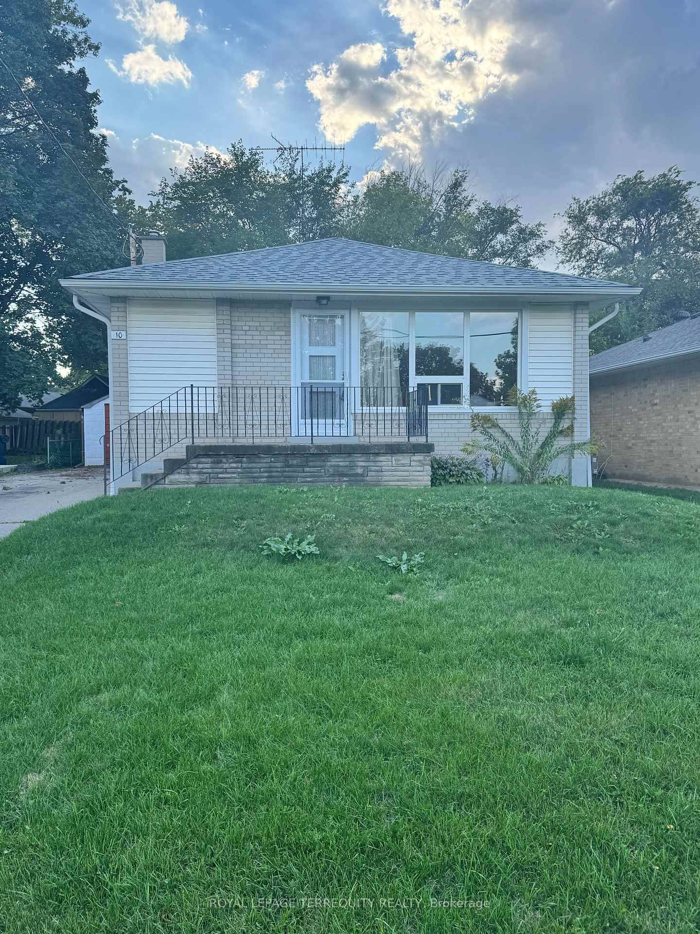 Nice bungalow with detached garage and separate side entrance leading to basement.