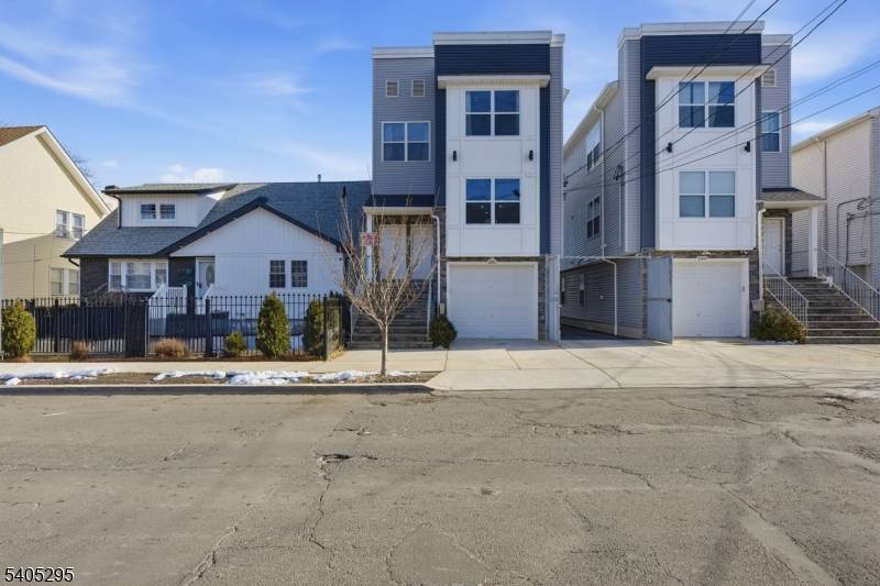 Home build 2022, 2 apartments with recreation room each apartment with 3 bedrooms, living room, dining room, kitchen and 2 baths, rec room with full bath 2 rooms.