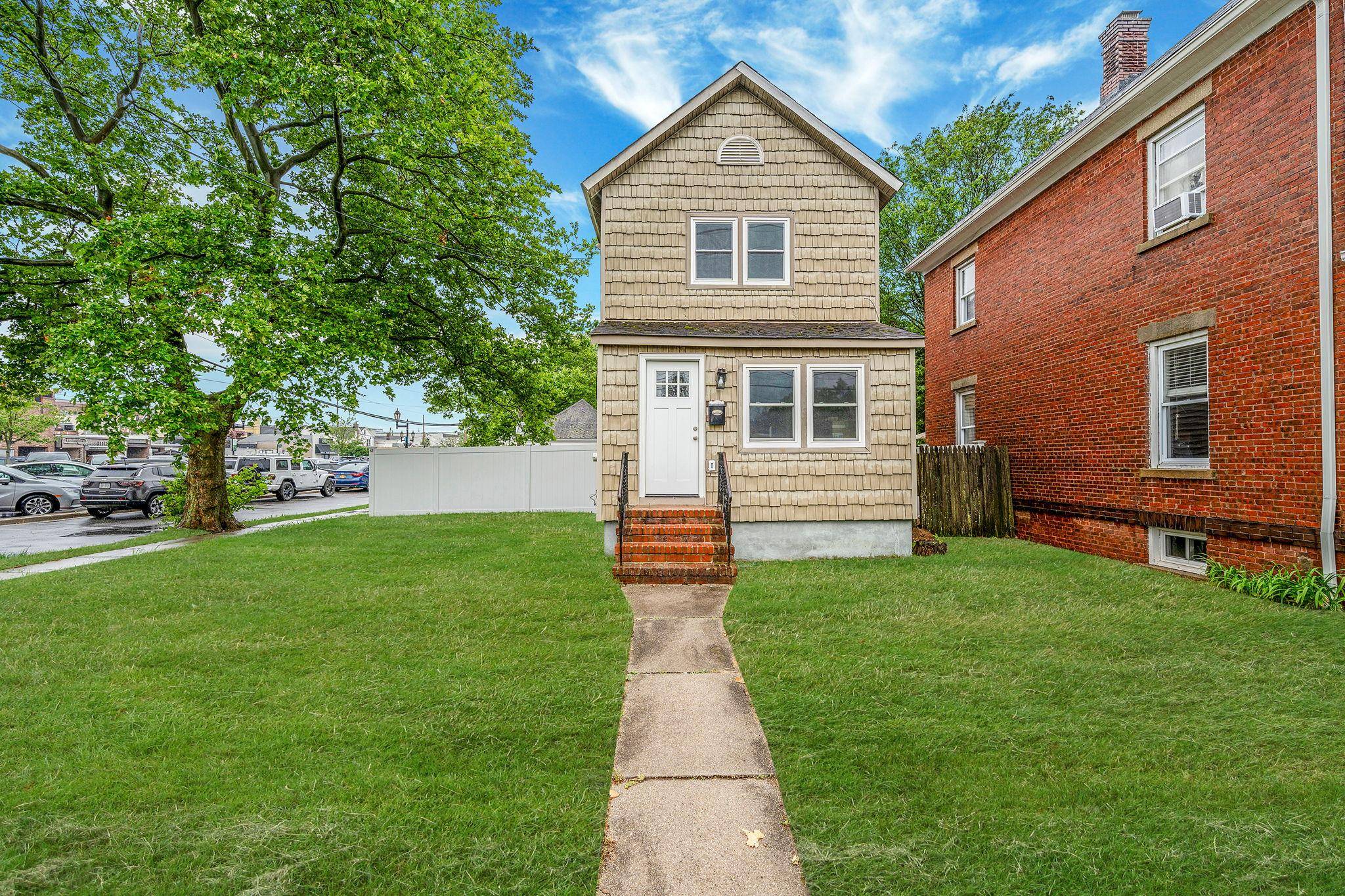 Charming Renovated Home in the Heart of Farmingdale Village Welcome to this beautifully renovated single family home featuring 3 spacious bedrooms and 2 pristine bathrooms.