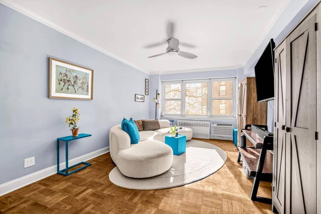 Sunny and happy home facing south over the gardens of the Schwab House on E 73 St.