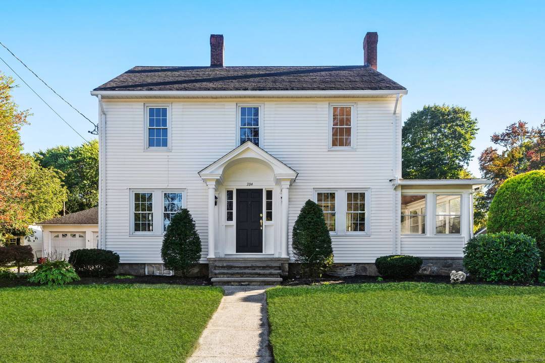 Experience timeless Colonial charm modern luxury in this fully renovated home on a beautifully landscaped corner lot in a great neighborhood.