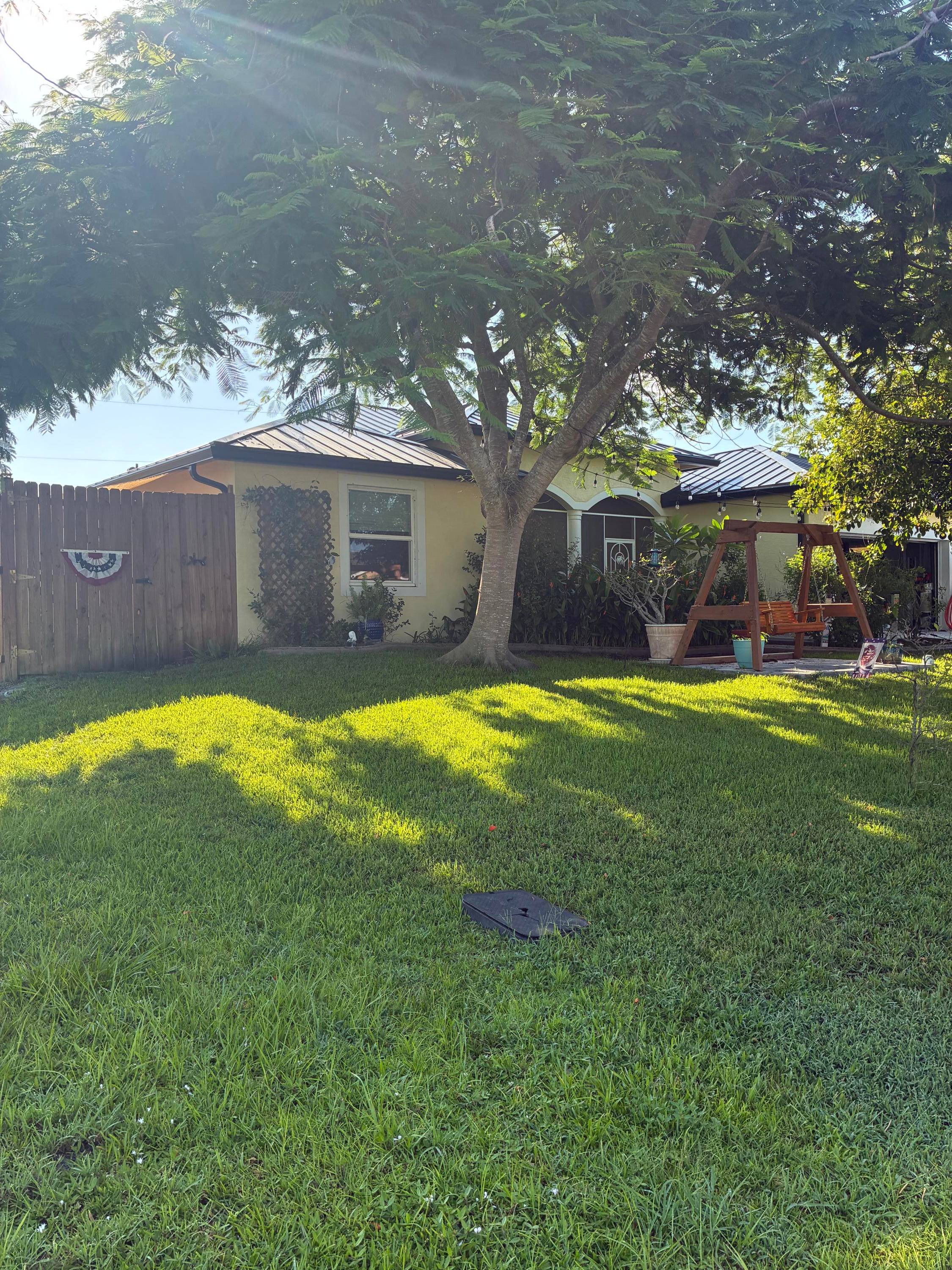 Live in your own tropical paradise with this updated 4 2 2 home with POOL and SPA in beautiful Port St Lucie, FL.