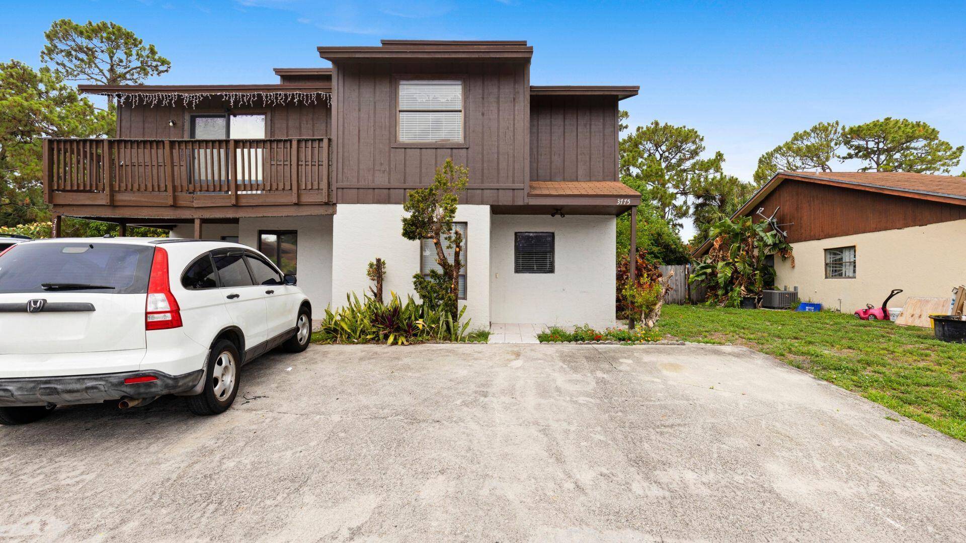 Move in ready and budget friendly, this charming townhome in the heart of Greenacres delivers comfort, practicality, and value.